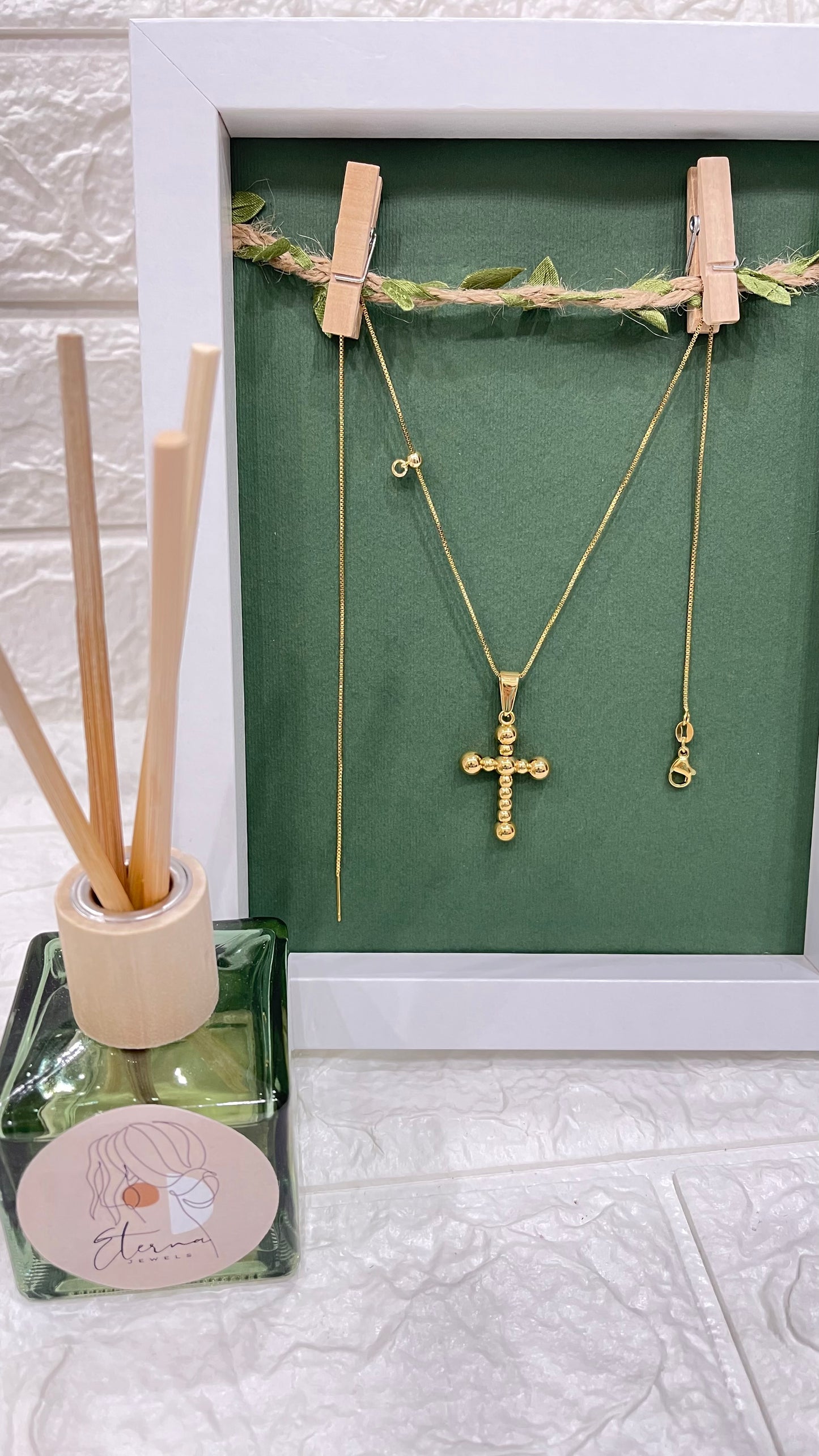 catenina saliscendi con pendente croce sfere