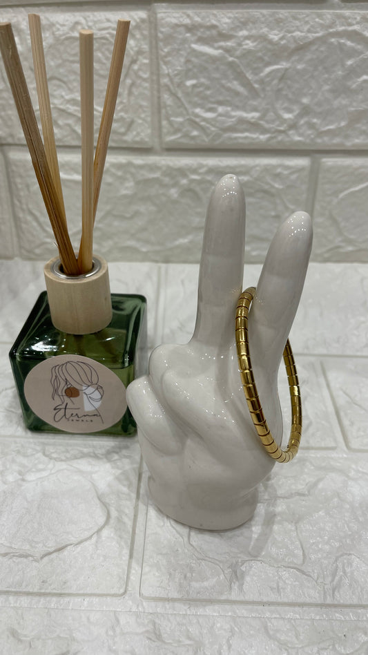 bracciale rigido con chiusura a scatto