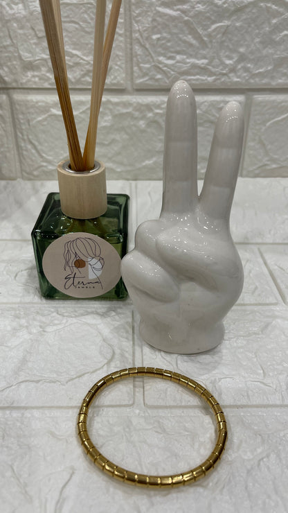 bracciale rigido con chiusura a scatto