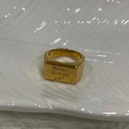 Anello "Never Give Up" (non mollare mai) in acciaio inox