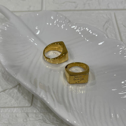 Anello "Never Give Up" (non mollare mai) in acciaio inox